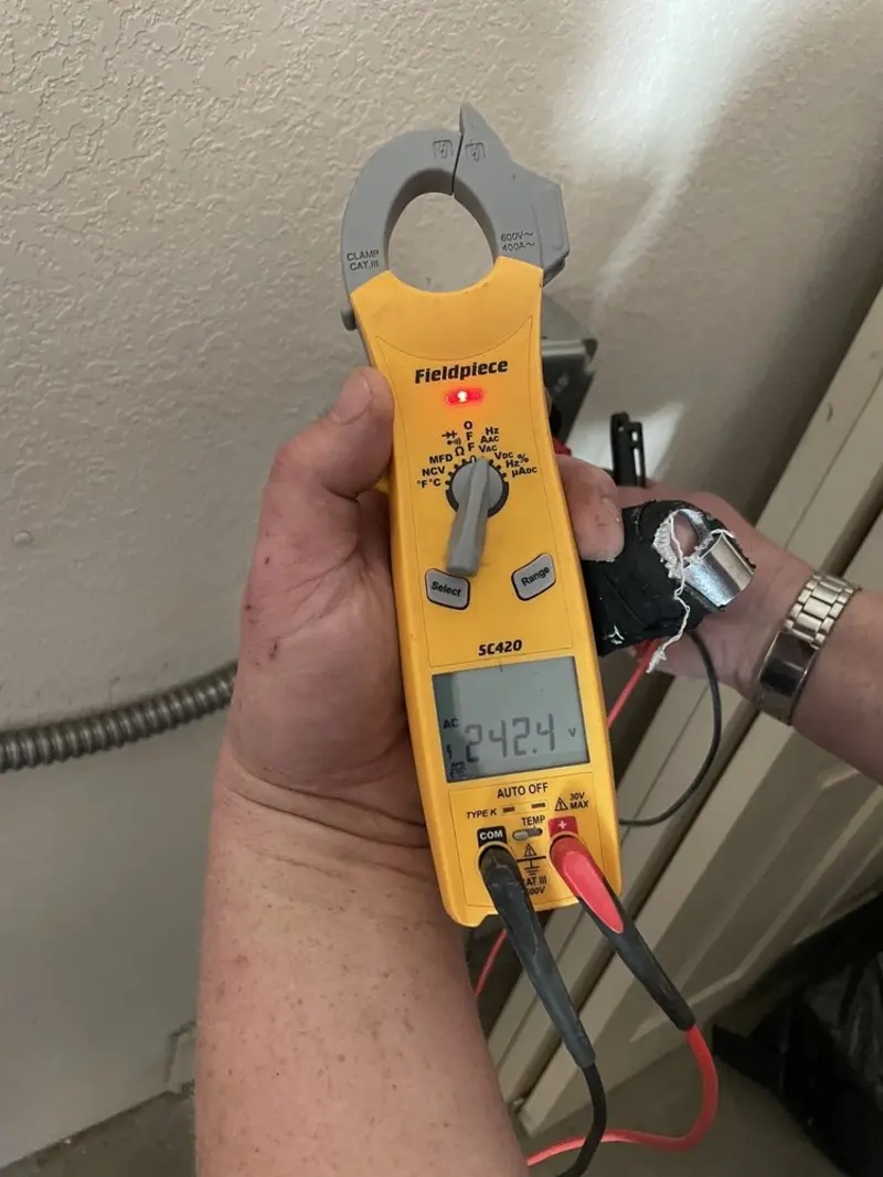 Voltage testing with clamp meter during Electrical Installation Services in Ringwood